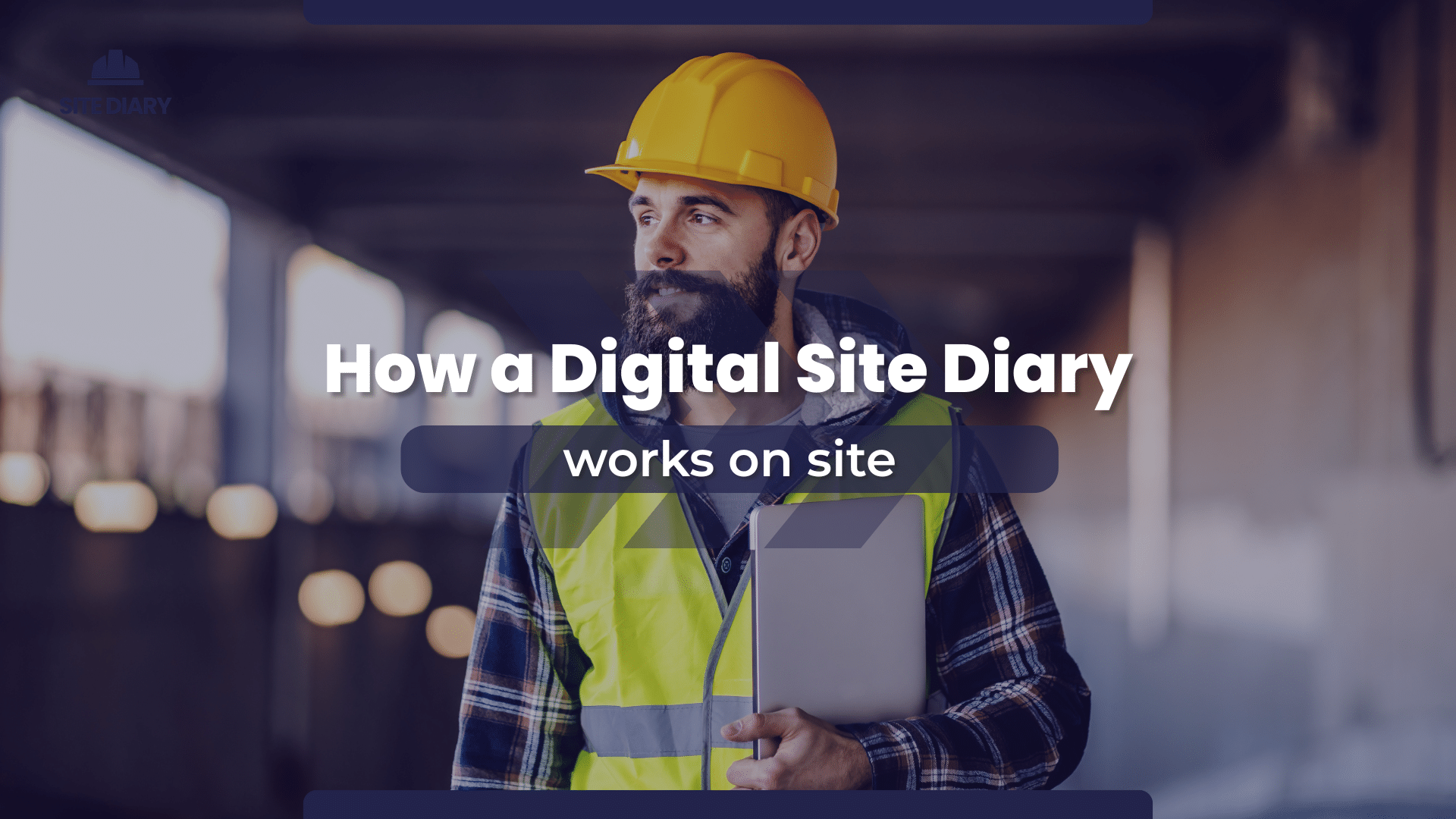 Man with a digital site diary